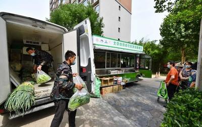 統一車身標識,“點對點”配送,300噸鮮菜直送社區